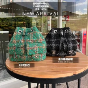 Chanel Quilted Tweed Drawstring Bucket Flap Backpack